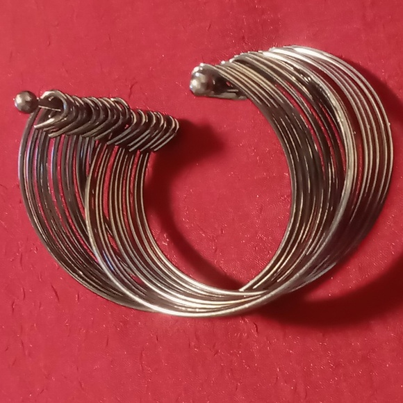 Blackened cuff  adjustable multi layered criss cross pattern. - Picture 4 of 4